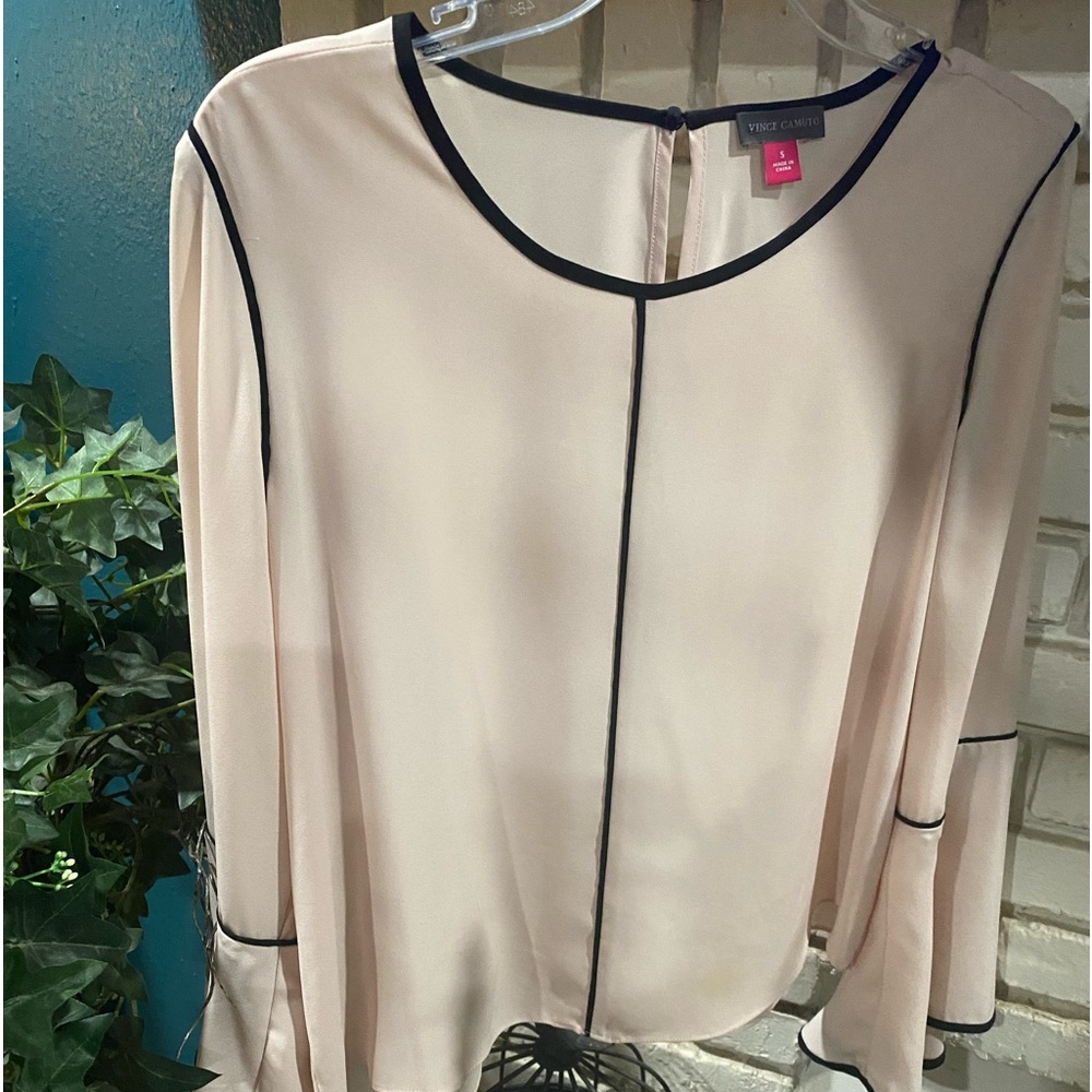 Blush pink trim in black blouse